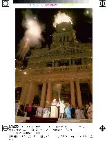 Olympic torch arrives in Sydney Town Hall amid fireworks display