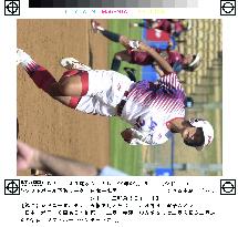 Saito rounds third for home in Japan-U.S. softball
