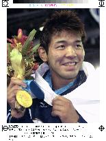 Takimoto takes gold in Olympic