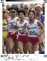 Japanese marathon trio run together early in race