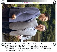 Mori, Kim take walk through plum orchard in Atami