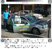 Japanese electric car completes round-the-world trip