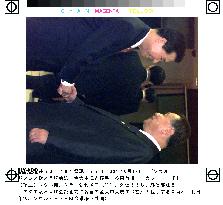 Prime Minister Mori greeted by President Kim