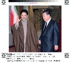 Mori, Khatami begin talks