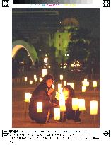 Candles lit around Atomic Bomb Dome