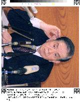 Hayami defends BOJ decision to scrap zero-rate last Aug.