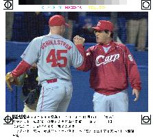 Carp edges Yakult