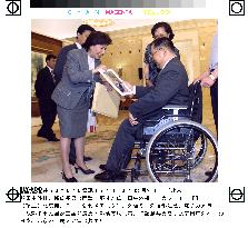 Tanaka meets Deng Xiaoping's son