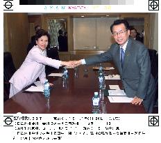 Tanaka, Han meet in Beijing