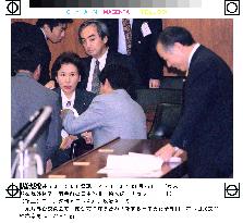 Tanaka appears before committee