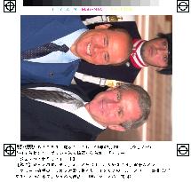 Bush received by Berlusconi in Genoa