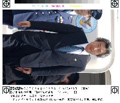 Koizumi returns to Japan from Genoa summit