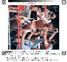 Kobayashi keeps WBA super flyweight crown with split decision
