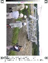 Bridge in Nagano buckles under floodwaters