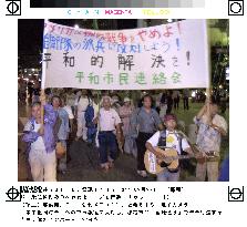 Civic groups rally against U.S. retaliation for terror attacks