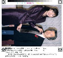 Koizumi presented necktie featuring his face