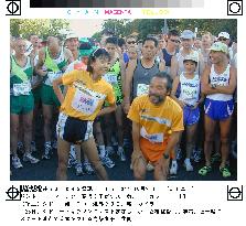 Olympic champ Takahashi runs as guest in Sydney Marathon