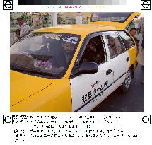 Kabul taxi drivers favor used Japanese cars