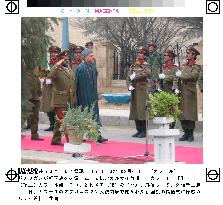 Karzai attends flag raise ceremony