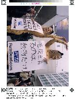 2 semi-naked anti-fur activists raise eyebrows in Tokyo