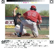 Shinjo slides into third base in preseason game