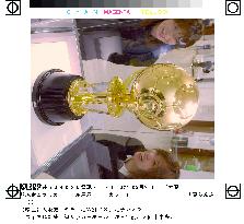 Pure gold soccer ball exhibited at Mitsukoshi's Osaka branch