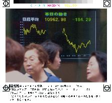 Tokyo stocks tumble on Wall Street fall