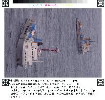 (1)Salvage vessels in E. China Sea to raise 'spy' ship