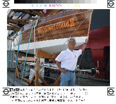 Solo trans-Pacific sailor Horie's yacht returns to Japan