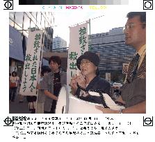 Families, supporters of alleged abductees rally in Tokyo