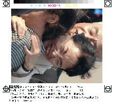 (2)Abductees, kin embrace after 24 years