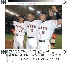 Uehara, Kiyohara, Shimizu pose after Yomiuri wins series opener