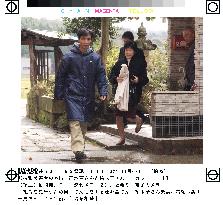 Hasuike couple visit bedridden grandmother