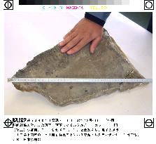 Piece of mortar found on Sanyo Shikansen tracks