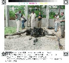 Remains of bomb-laden car shown to press