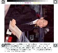 Nobel laureate Tanaka claims prize money