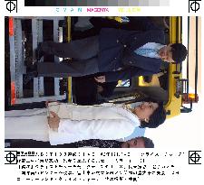 Japan crown prince, princess ride snow car