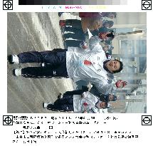Ex-sumo wrestler Mainoumi carries Asian Games torch