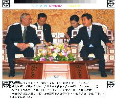 Powell talks with new S. Korean President Roh