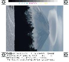 Cap cloud hangs over Mt. Fuji