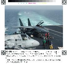 U.S. Navy allows media aboard Kitty Hawk to observe drills