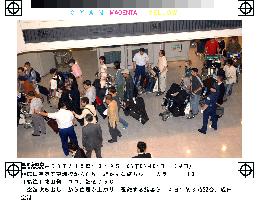 (1)Passengers at Narita airport evacuate due to smoke