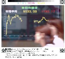 Tokyo's Nikkei closes above 9,000