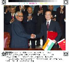 India, China ink comprehensive cooperation pact
