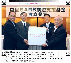 Tanimura donates 15 mil. yen to eradicate SARS in China