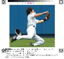 Matsui dives for catch