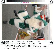 Green Santa Claus arrives in Japan