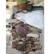 American soldiers and bride in Baghdad