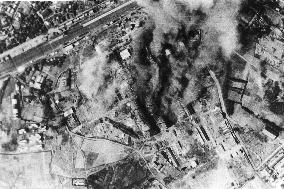 Tokyo scorched and smoldering from air raids