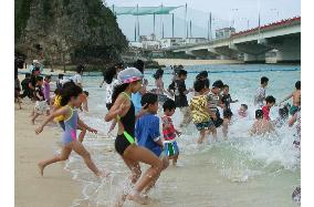 Okinawa beach opens for summer tourism season